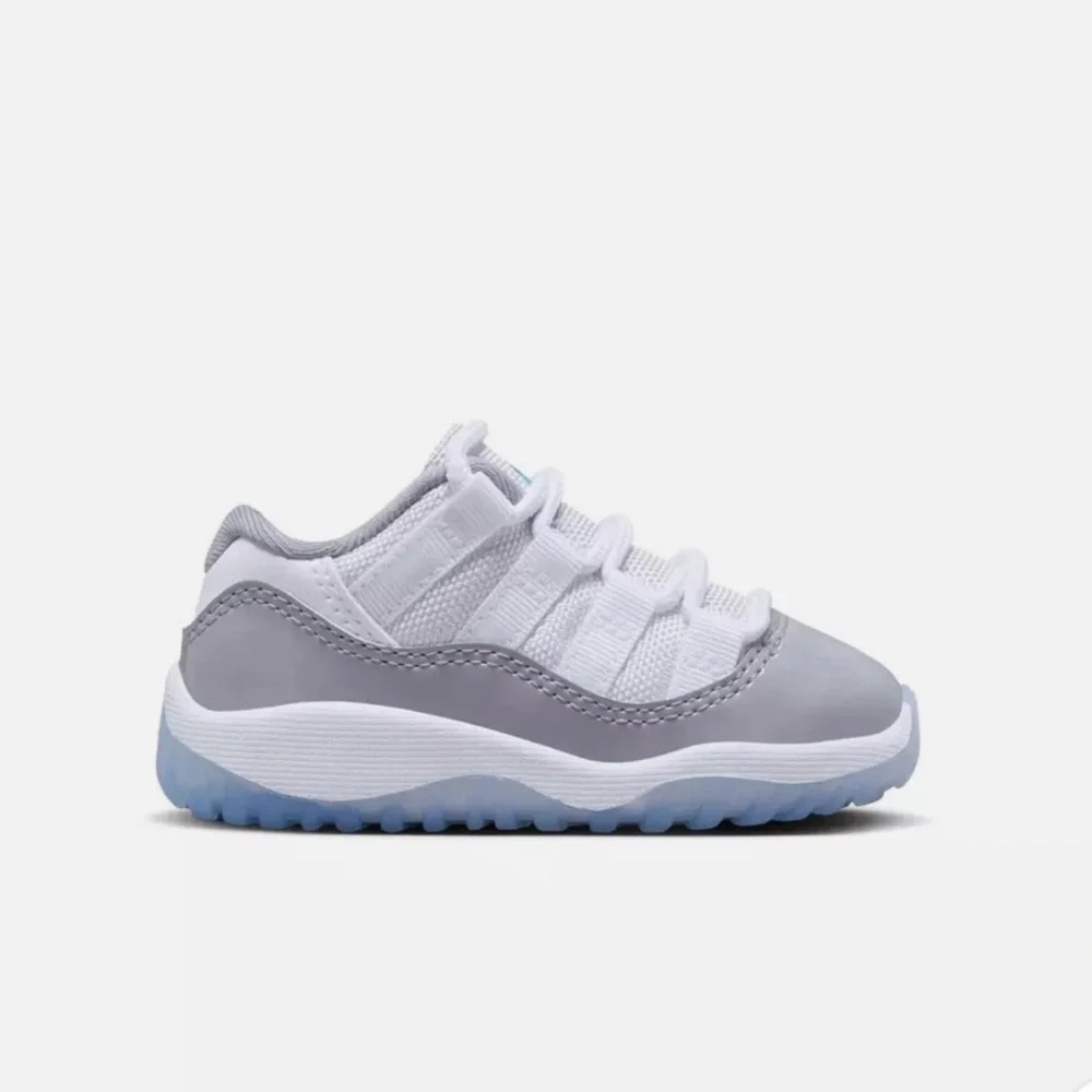 NWOT Nike Kids Air Jordan Retro 11 Low - Grey and White with Ice Blue Sole